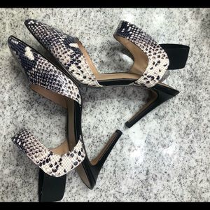 Franco Sarto black and snakeskin pump.